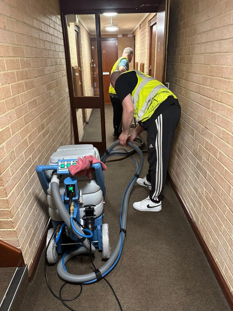 professional carpet cleaning equipment in communal area